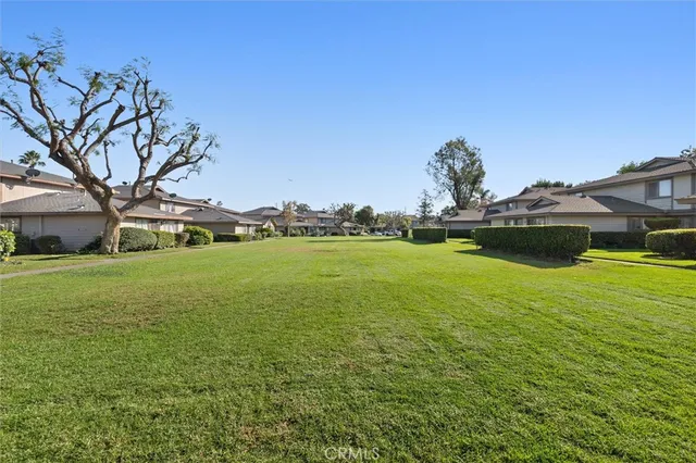 a view of a golf course with a garden