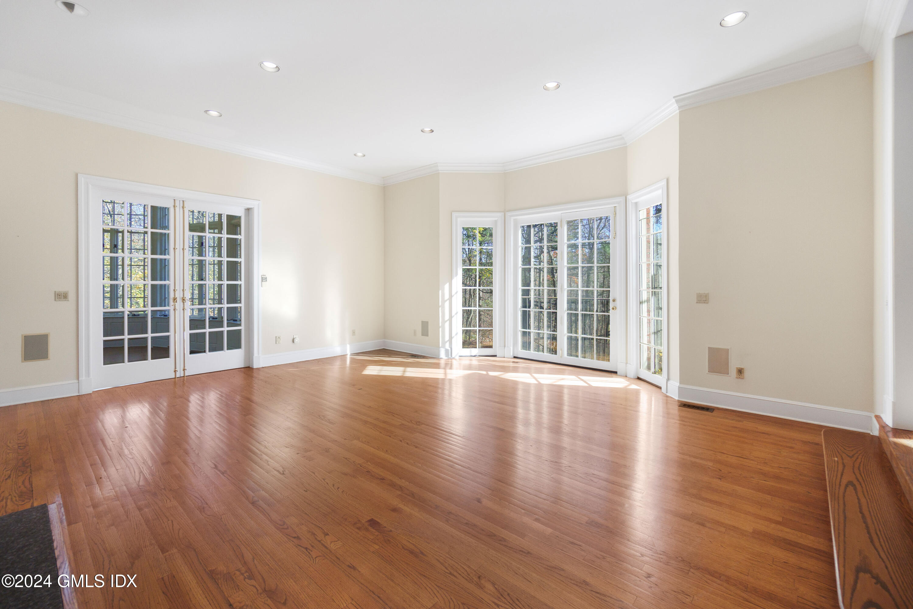 534 Stanwich Road Greenwich, CT 06831 - Photo 14 of 30 wooden floor in an empty room with a window