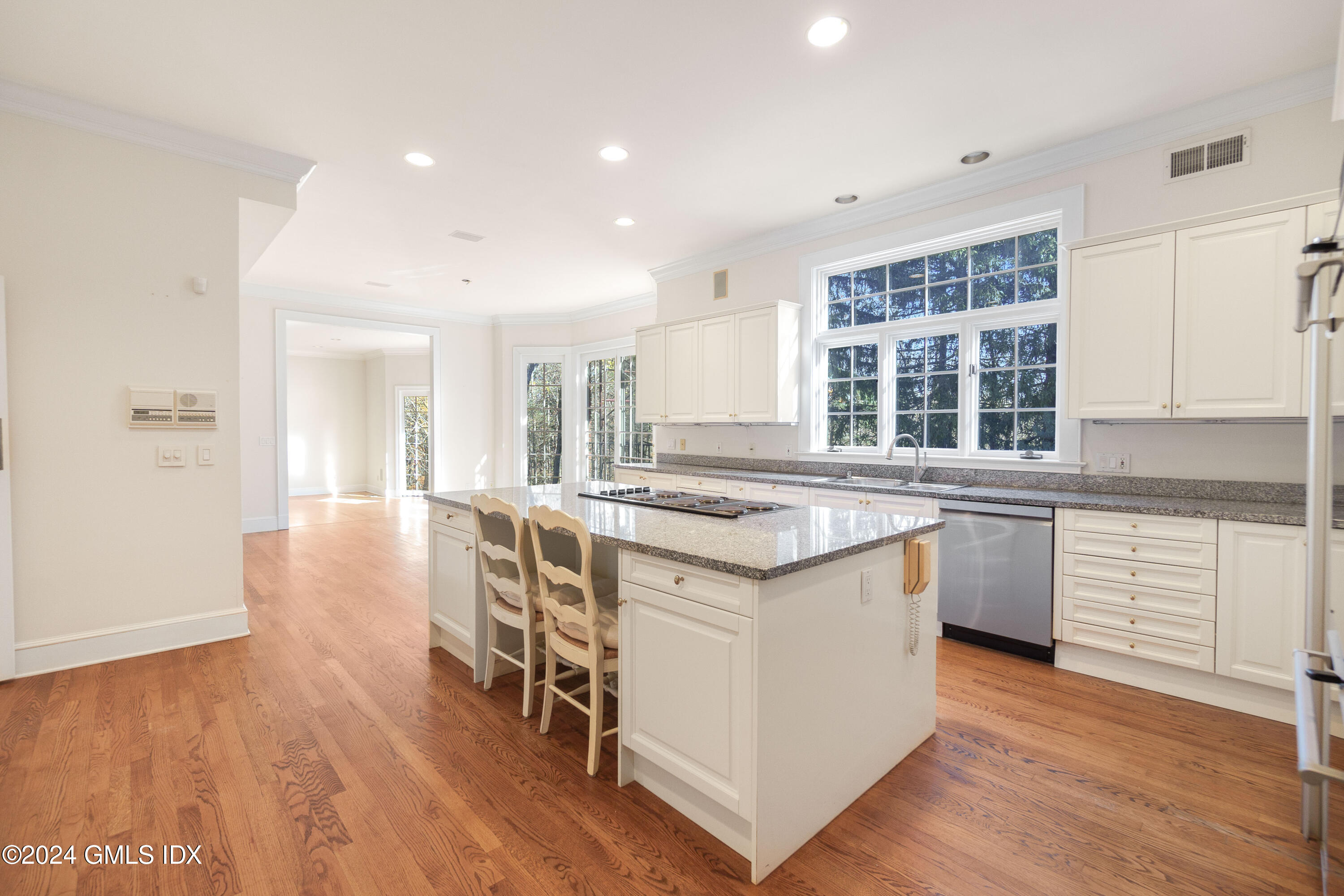 534 Stanwich Road Greenwich, CT 06831 - Photo 16 of 30 a kitchen with a stove and wooden floor