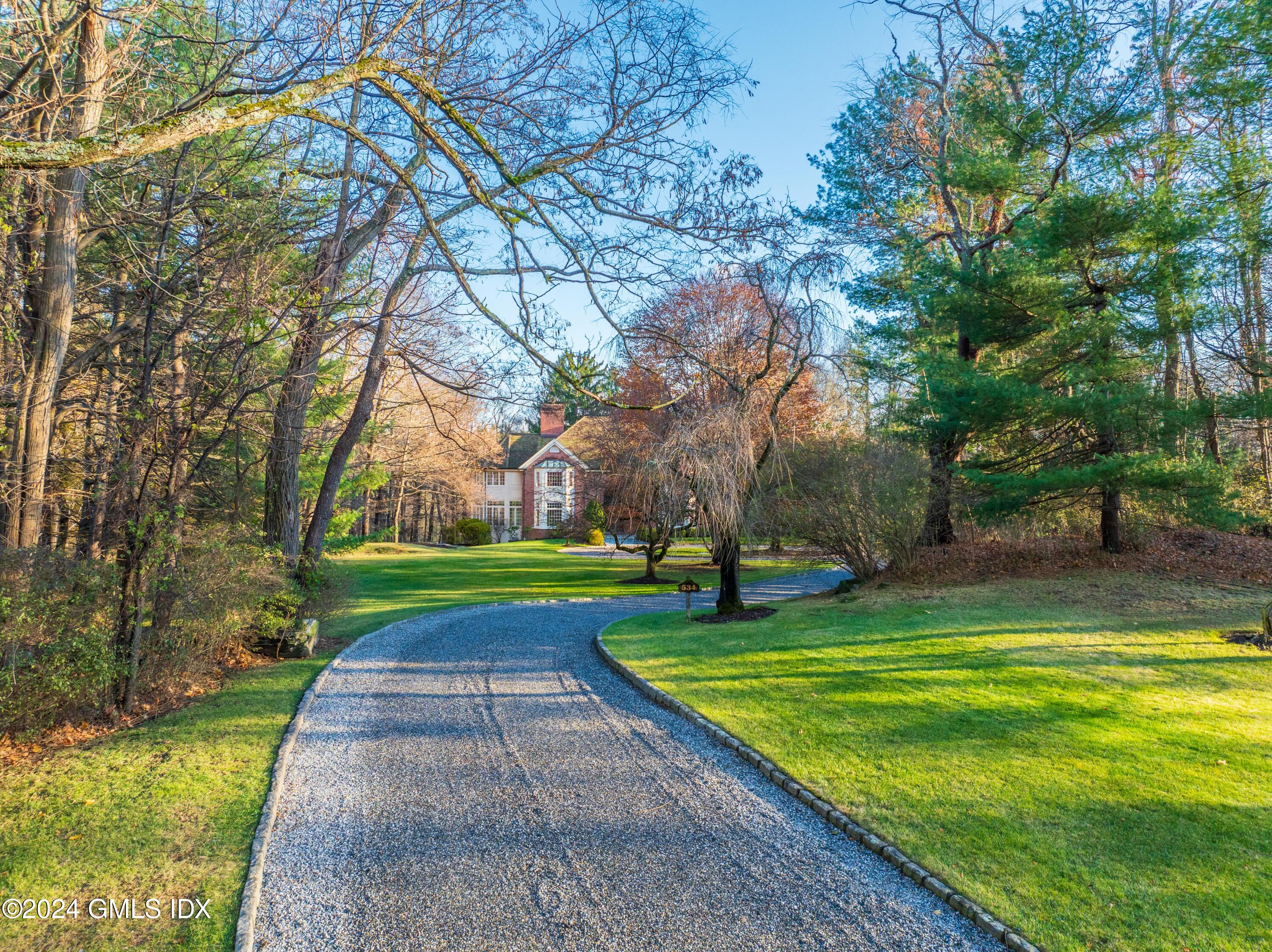 534 Stanwich Road Greenwich, CT 06831 - Photo 3 of 30 a view of a park with large trees