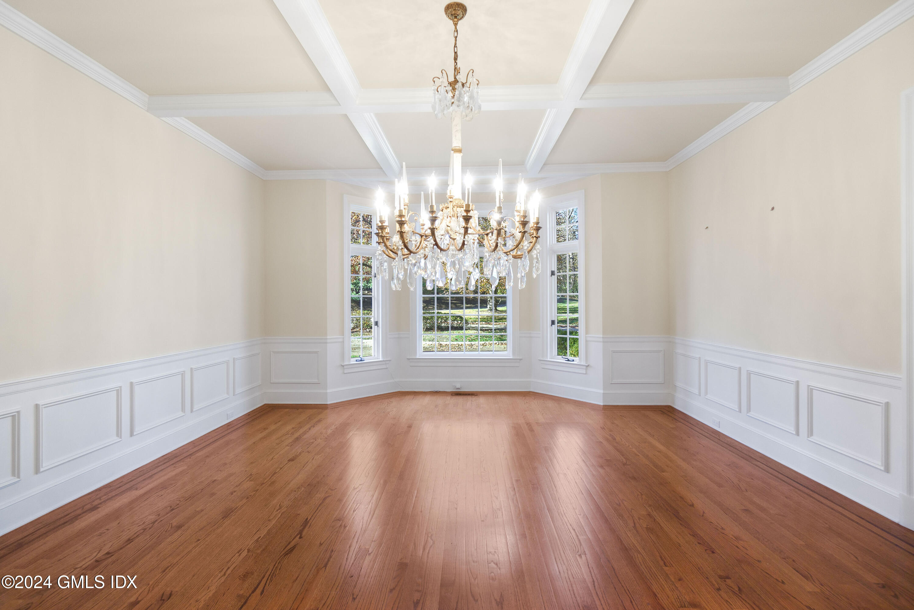 534 Stanwich Road Greenwich, CT 06831 - Photo 10 of 30 a view of an empty room with wooden floor and a window