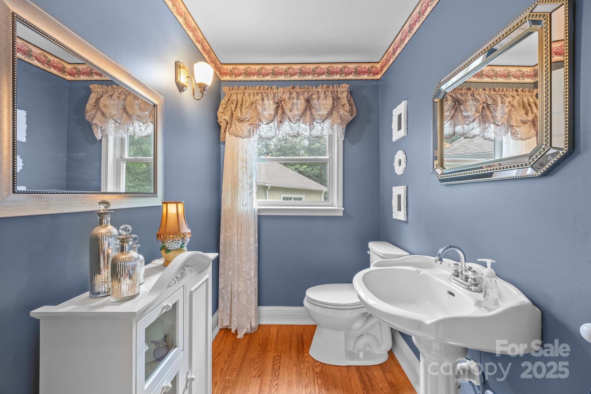 235 Kinder Lane Canton, NC 28716 - Photo 22 of 48 a bathroom with a sink and a toilet
