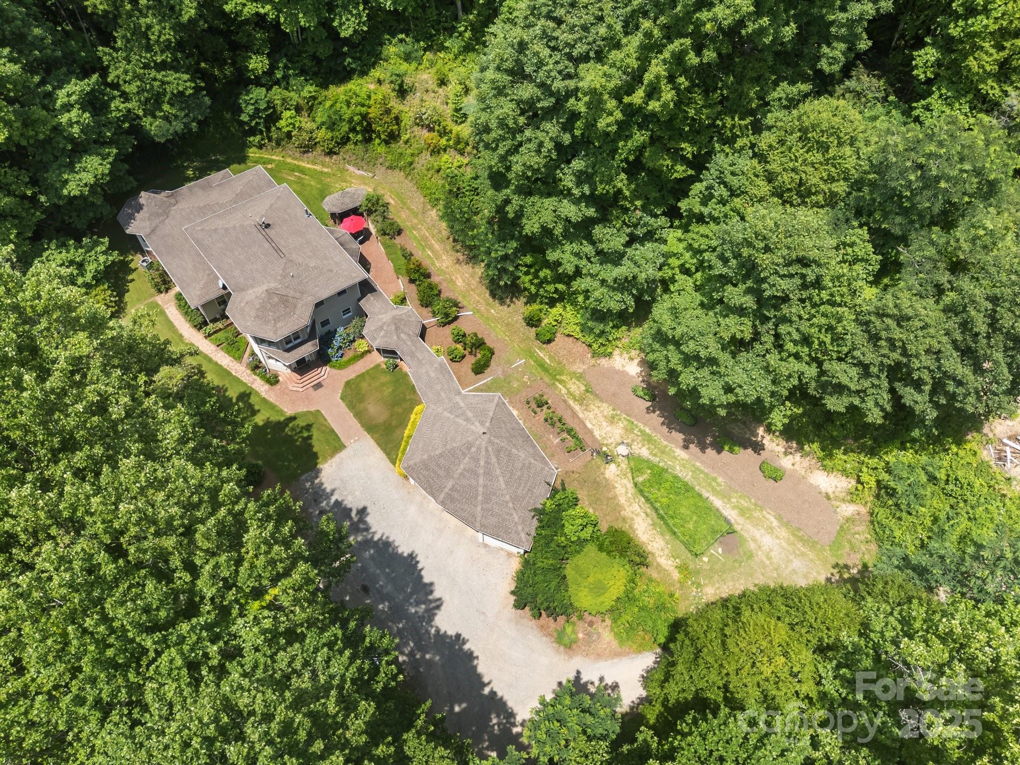 235 Kinder Lane Canton, NC 28716 - Photo 36 of 48 an aerial view of residential house with outdoor space and trees all around