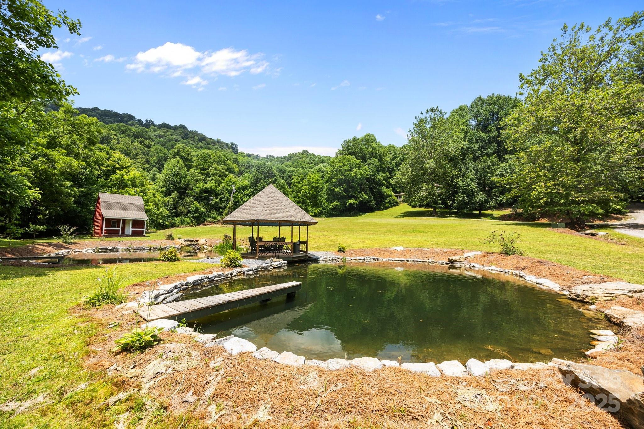 235 Kinder Lane Canton, NC 28716 - Photo 41 of 48 a view of swimming pool and lake view