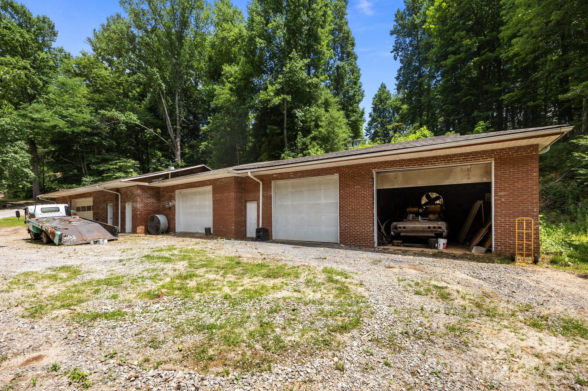 235 Kinder Lane Canton, NC 28716 - Photo 47 of 48 a view of a house with a yard