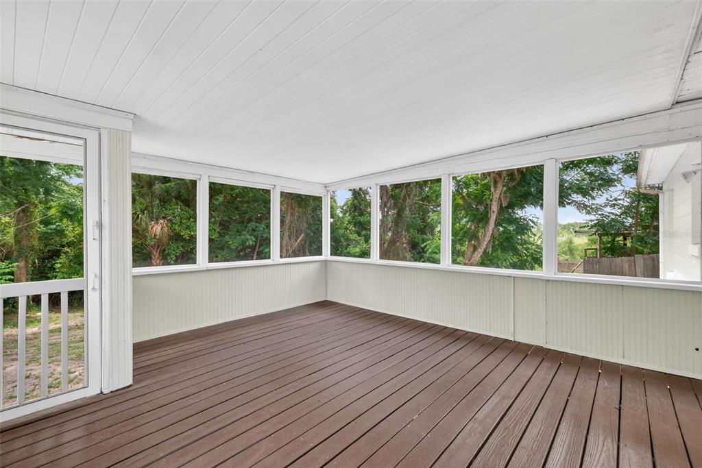 36 Bay Ridge Loop Mascotte, FL 34753 - Photo 26 of 32 a view of wooden floor and windows in a room