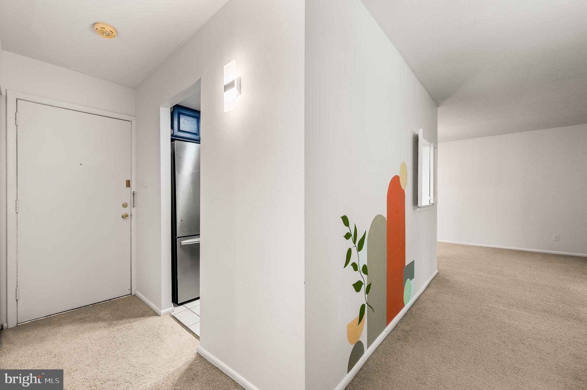 288 Drummers Lane, Unit 288 Wayne, PA 19087 - Photo 12 of 30 an entryway with a workspace