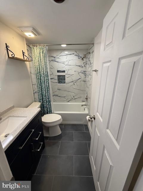 288 Drummers Lane, Unit 288 Wayne, PA 19087 - Photo 17 of 30 a bathroom with a granite countertop sink toilet and shower