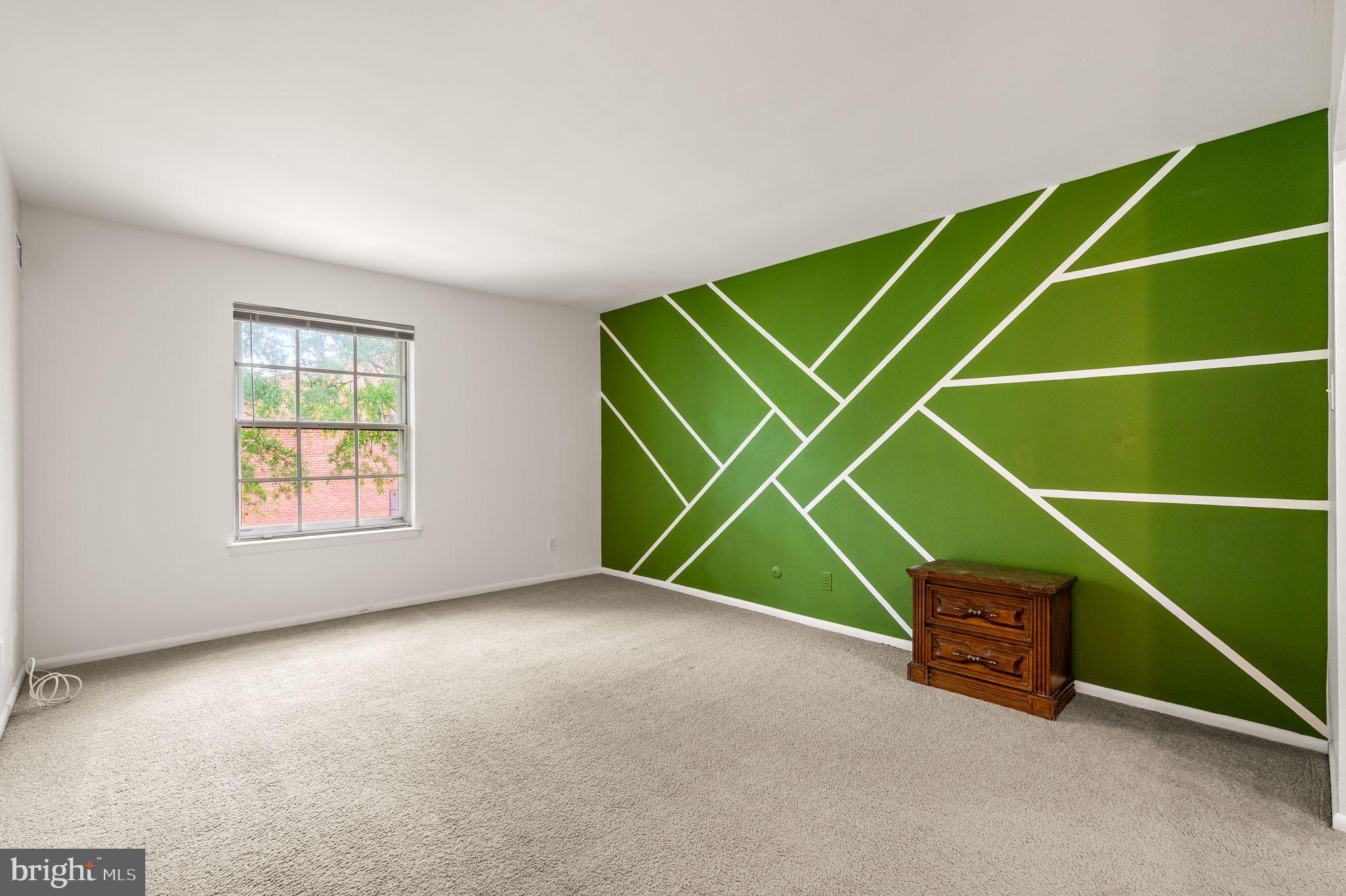 288 Drummers Lane, Unit 288 Wayne, PA 19087 - Photo 18 of 30 an empty room with windows