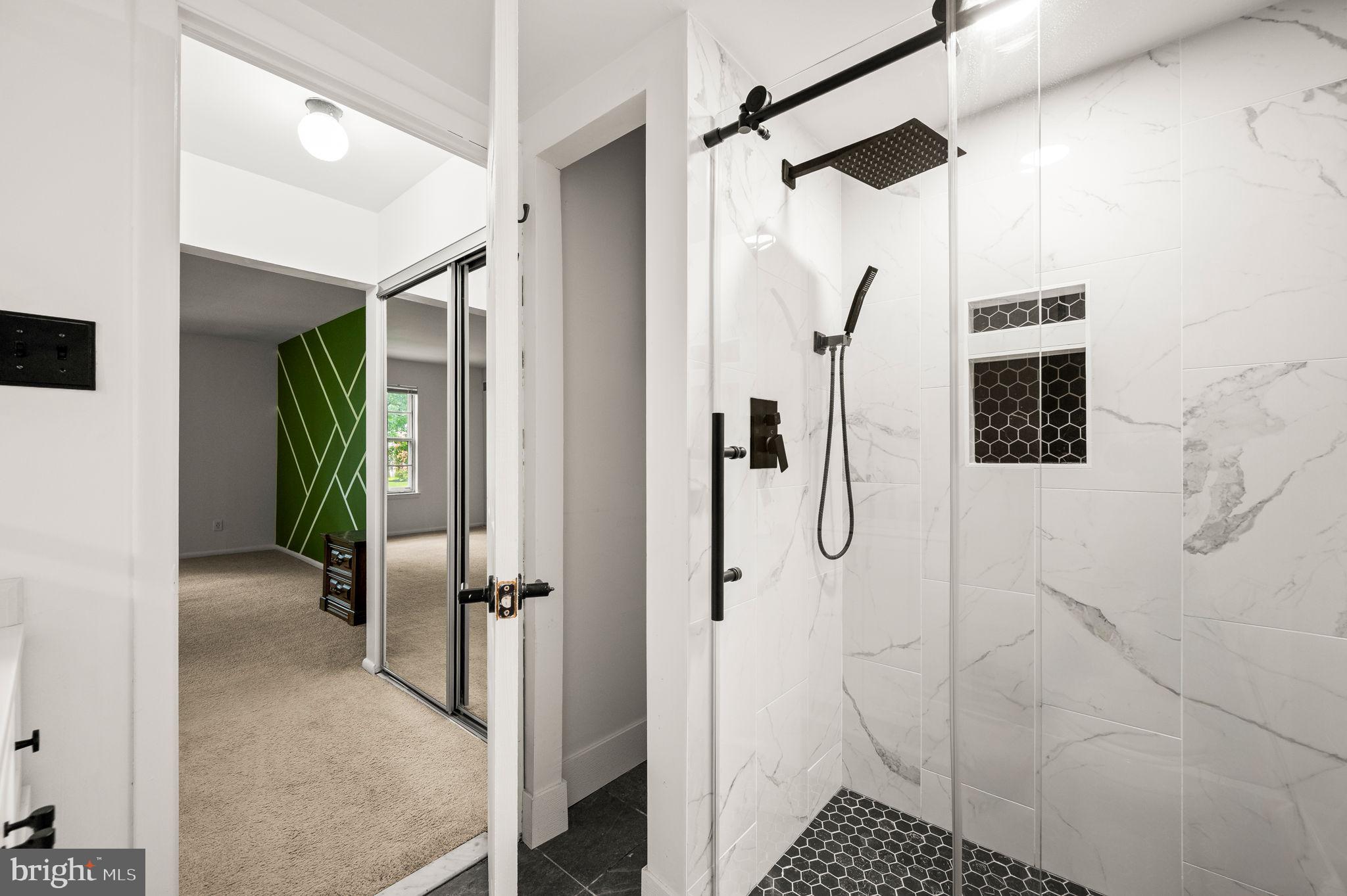 288 Drummers Lane, Unit 288 Wayne, PA 19087 - Photo 21 of 30 a bathroom with a shower