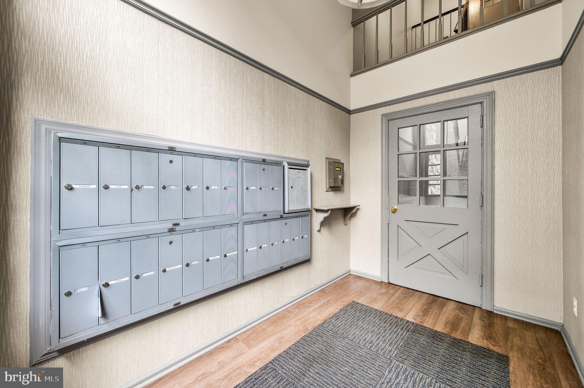 288 Drummers Lane, Unit 288 Wayne, PA 19087 - Photo 24 of 30 an entryway with wooden floor