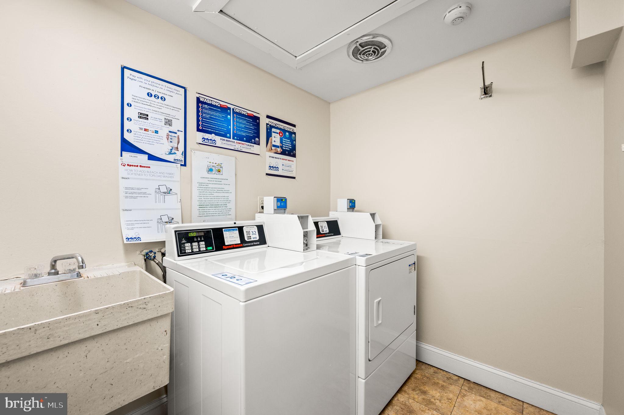 288 Drummers Lane, Unit 288 Wayne, PA 19087 - Photo 25 of 30 a utility room with dryer and washer