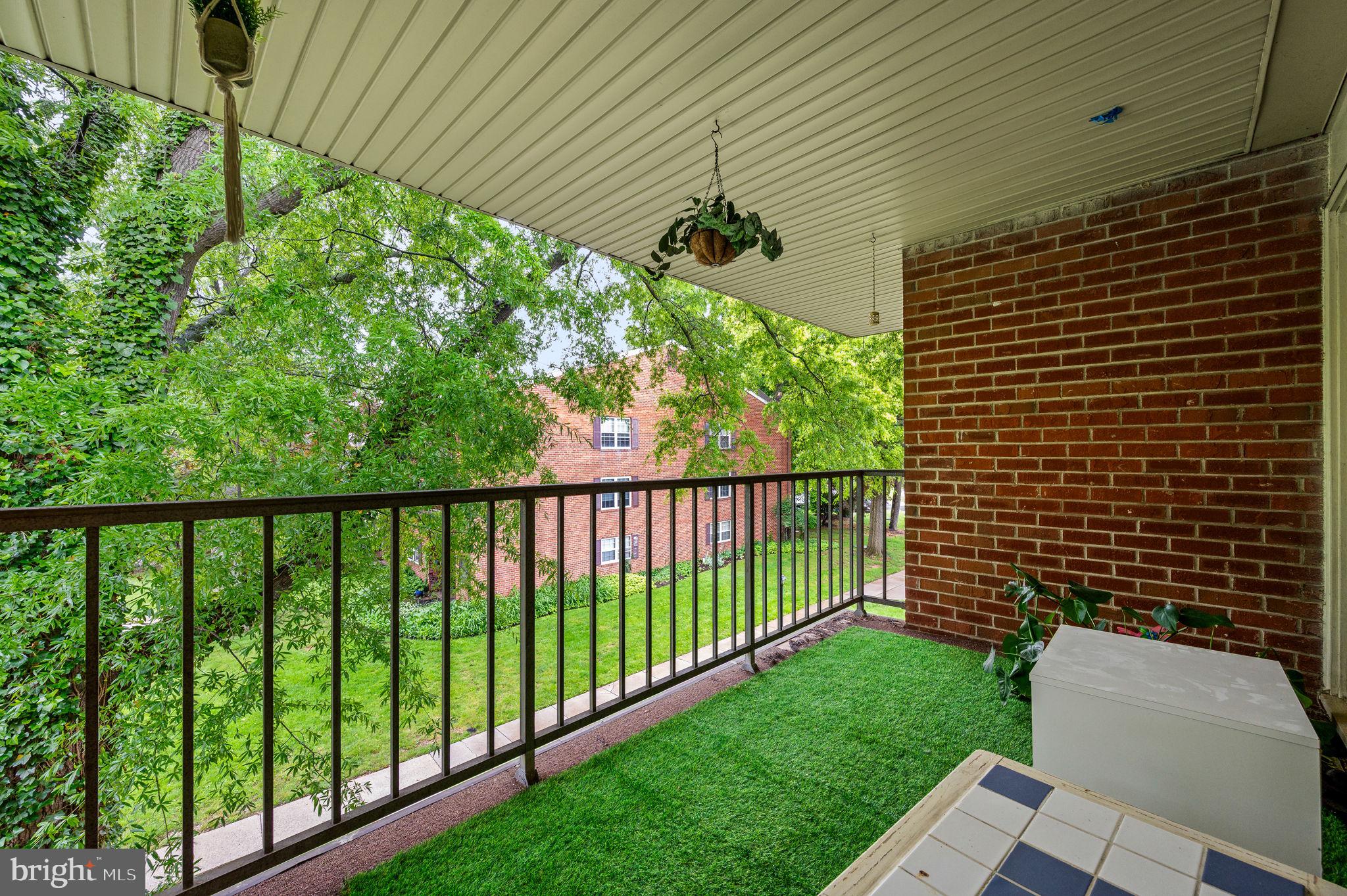 288 Drummers Lane, Unit 288 Wayne, PA 19087 - Photo 3 of 30 a view of a porch with a yard