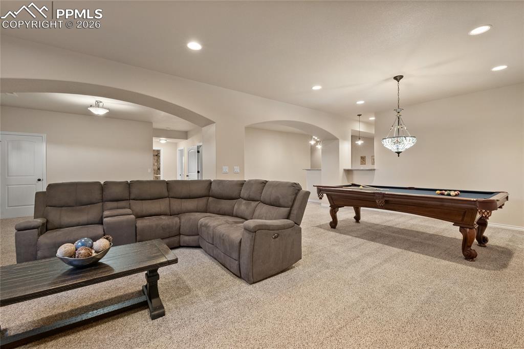 3718 Sky Rim Court Colorado Springs, CO 80908 - Photo 36 of 49 Lower level family room.