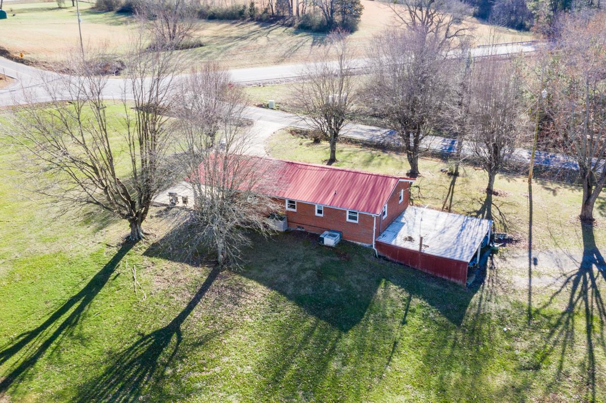 806 North Corinth Road Portland, TN 37148 - Photo 15 of 28 a view of a backyard with sitting area