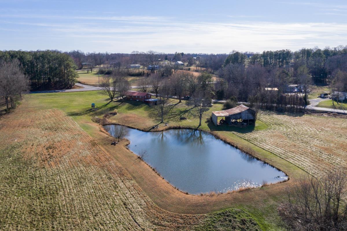 806 North Corinth Road Portland, TN 37148 - Photo 3 of 28 a view of a swimming pool with a yard and mountain view