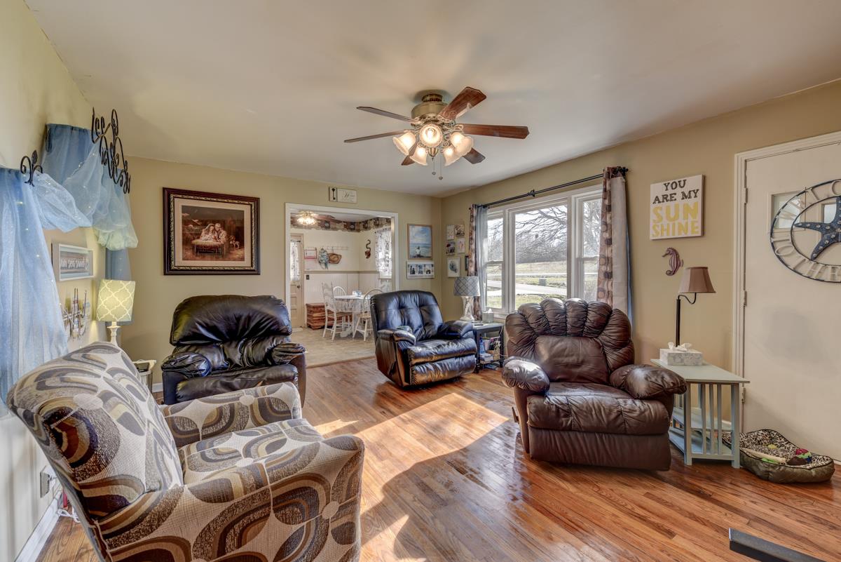 806 North Corinth Road Portland, TN 37148 - Photo 7 of 28 a living room with furniture ceiling fan and a window