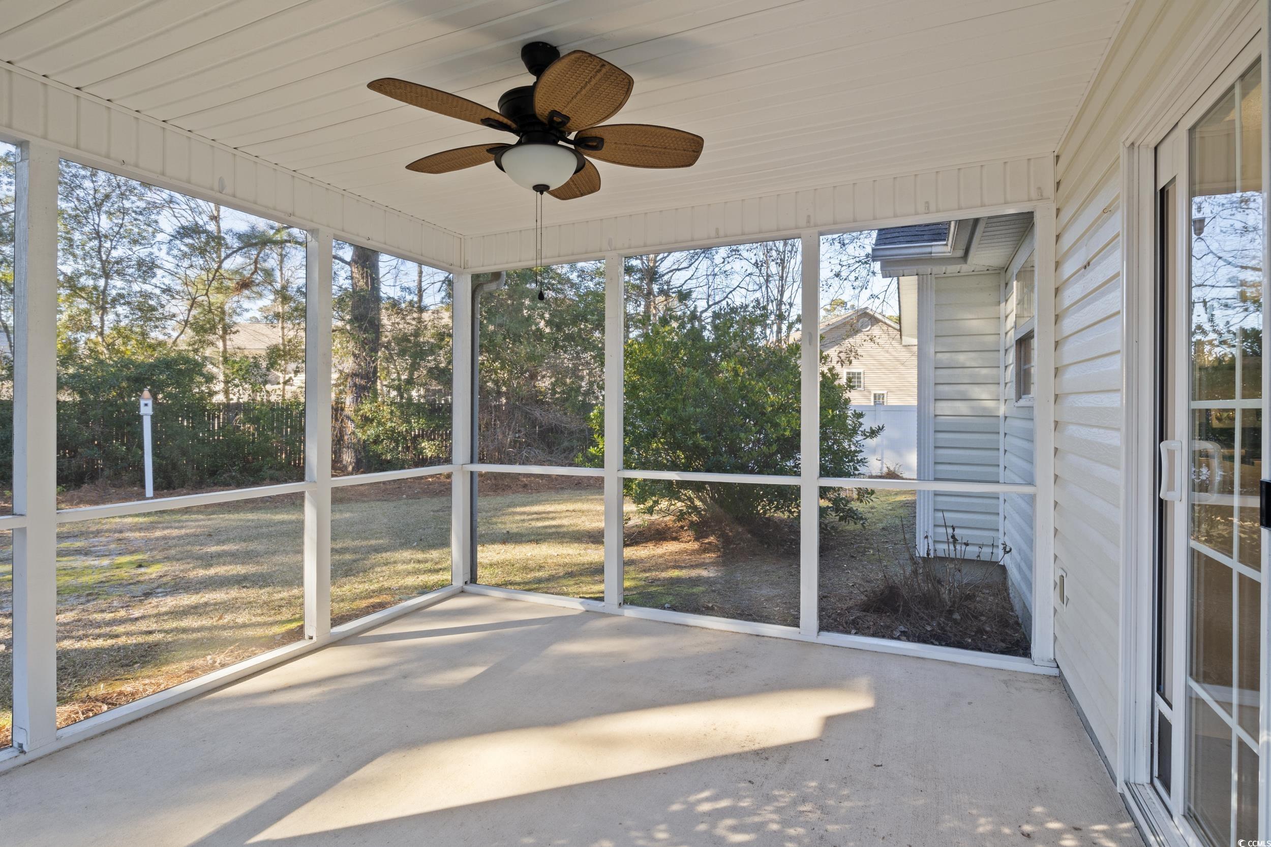 5933 Rahnavard Boulevard Myrtle Beach, SC 29588 - Photo 18 of 25 Unfurnished sunroom with ceiling fan