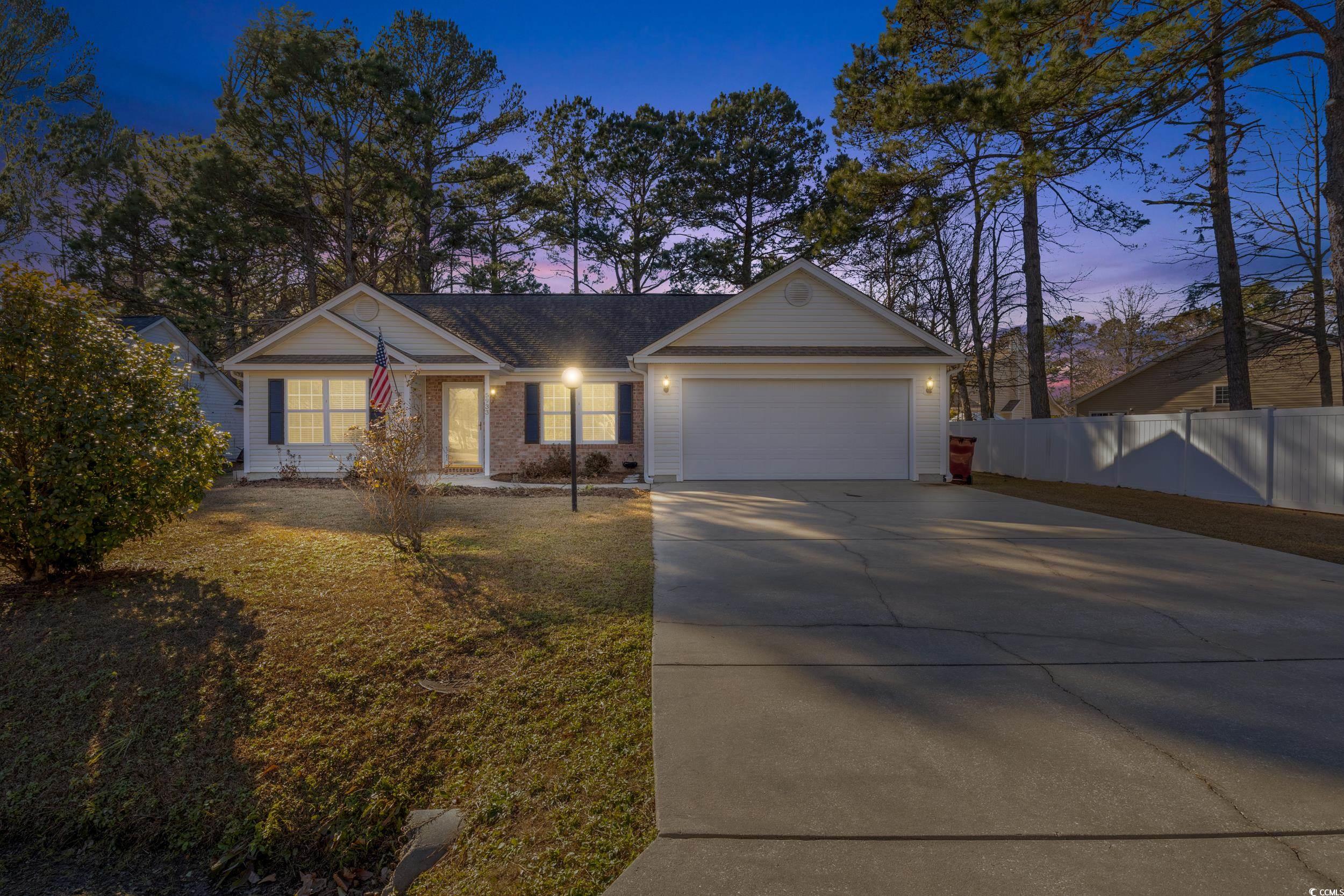 5933 Rahnavard Boulevard Myrtle Beach, SC 29588 - Photo 24 of 25 Ranch-style house with a garage