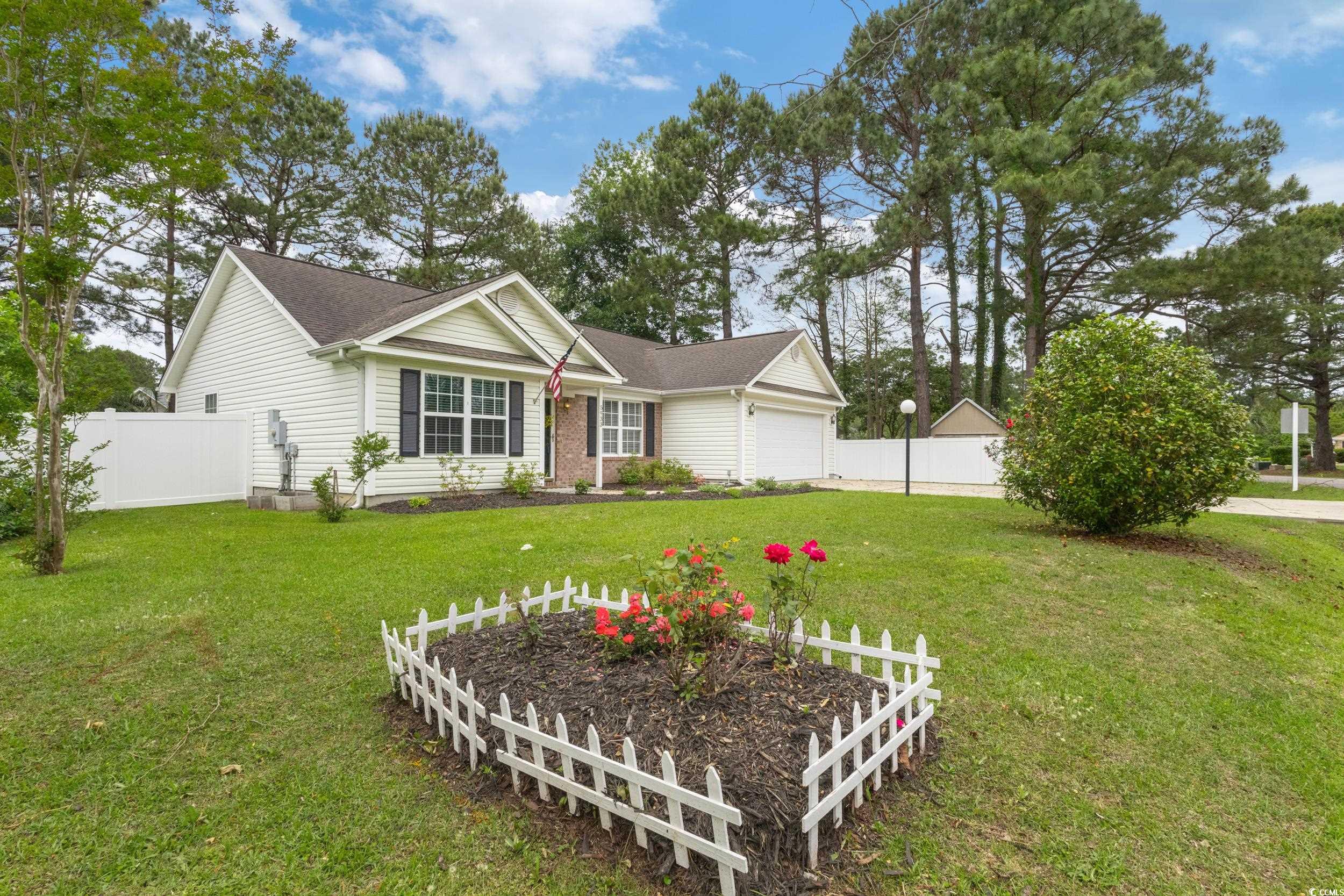 5933 Rahnavard Boulevard Myrtle Beach, SC 29588 - Photo 4 of 25 Ranch-style house with fence, a front yard, and a