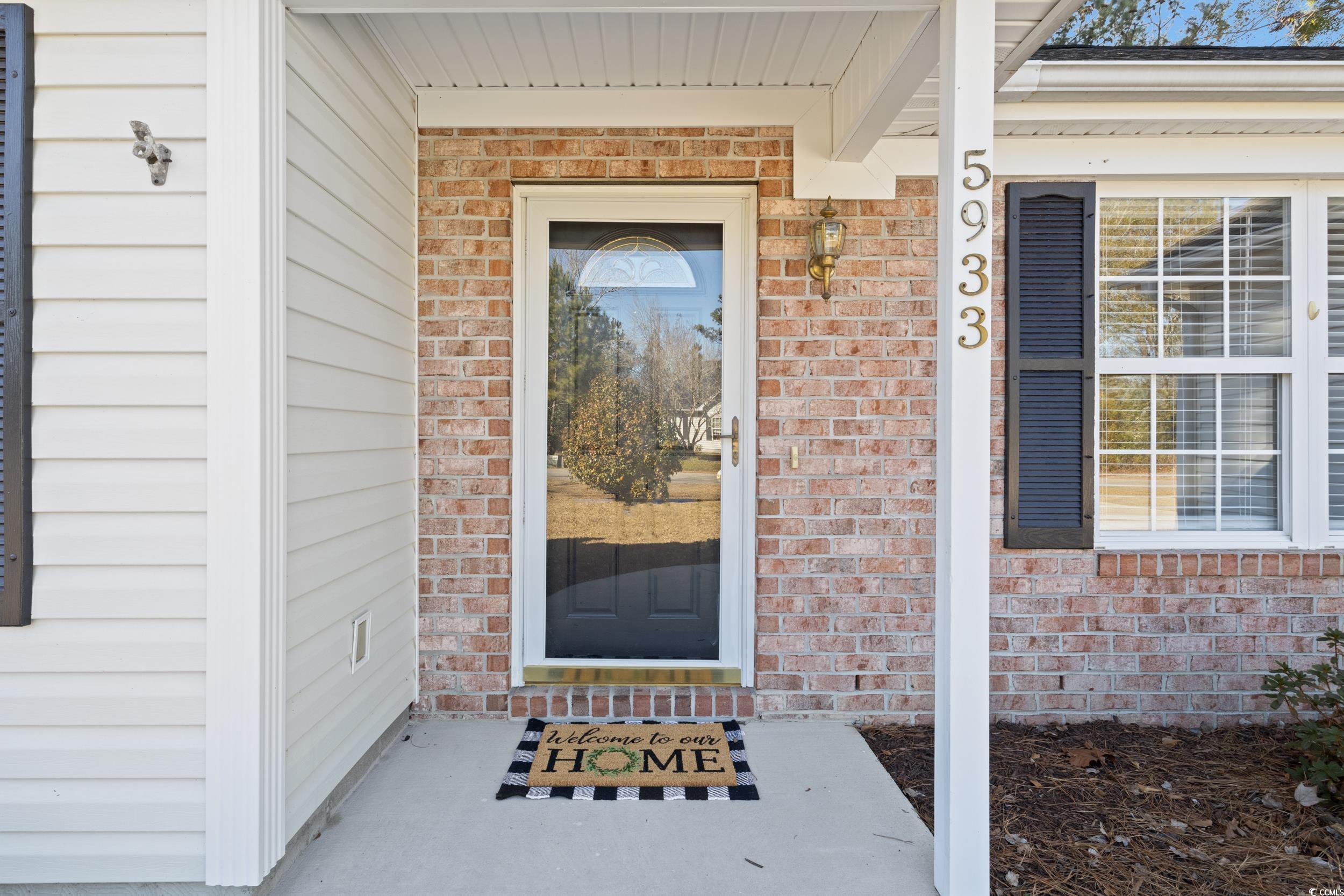5933 Rahnavard Boulevard Myrtle Beach, SC 29588 - Photo 5 of 25 View of exterior entry