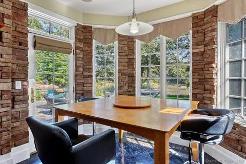 a view of a livingroom with furniture and window