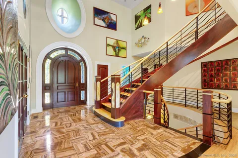 a view of an entryway with staircase
