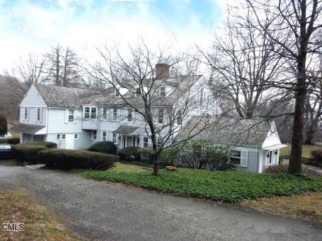 360 Mine Hill Road Fairfield, CT 06824 - Photo 1 of 1 a view of a street with a parked cars