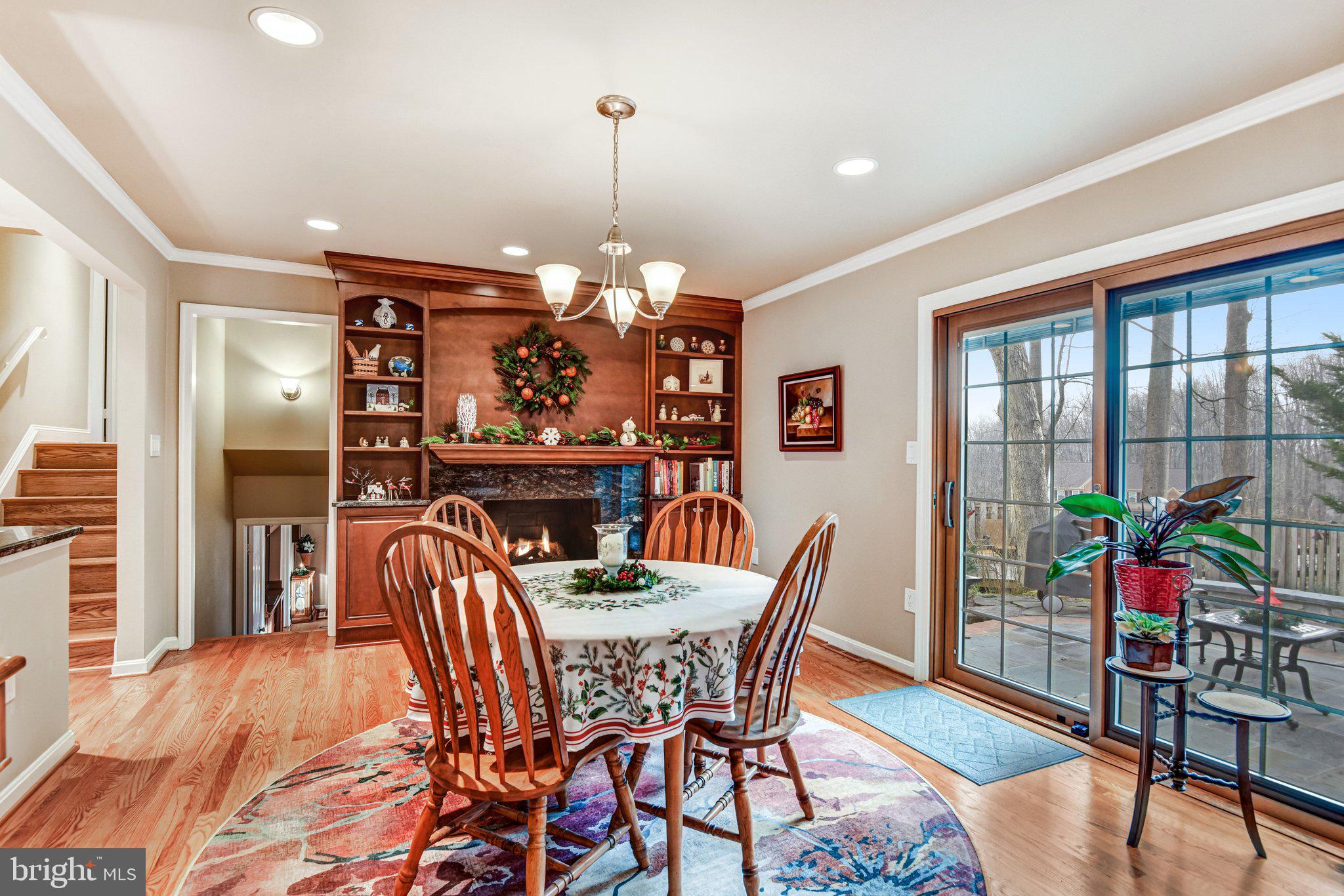 10111 Evans Ford Road Manassas, VA 20111 - Photo 11 of 35 a view of a dining room with furniture window and wooden floor