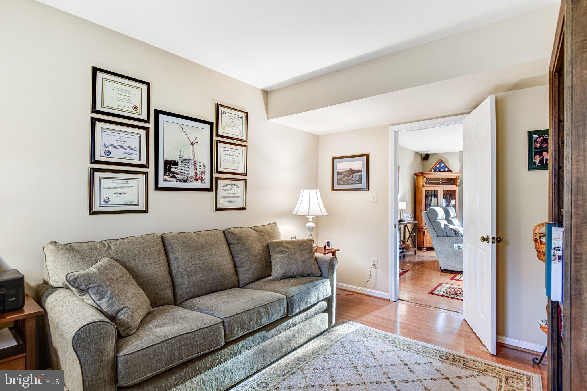 10111 Evans Ford Road Manassas, VA 20111 - Photo 23 of 35 a living room with furniture and a couch