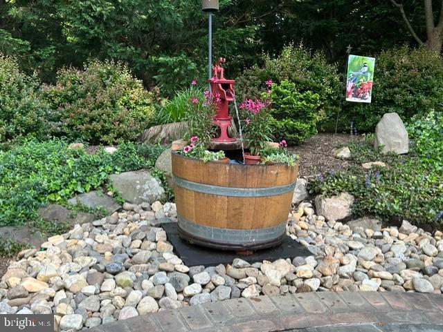 10111 Evans Ford Road Manassas, VA 20111 - Photo 29 of 35 a wooden bench sitting in the middle of a yard