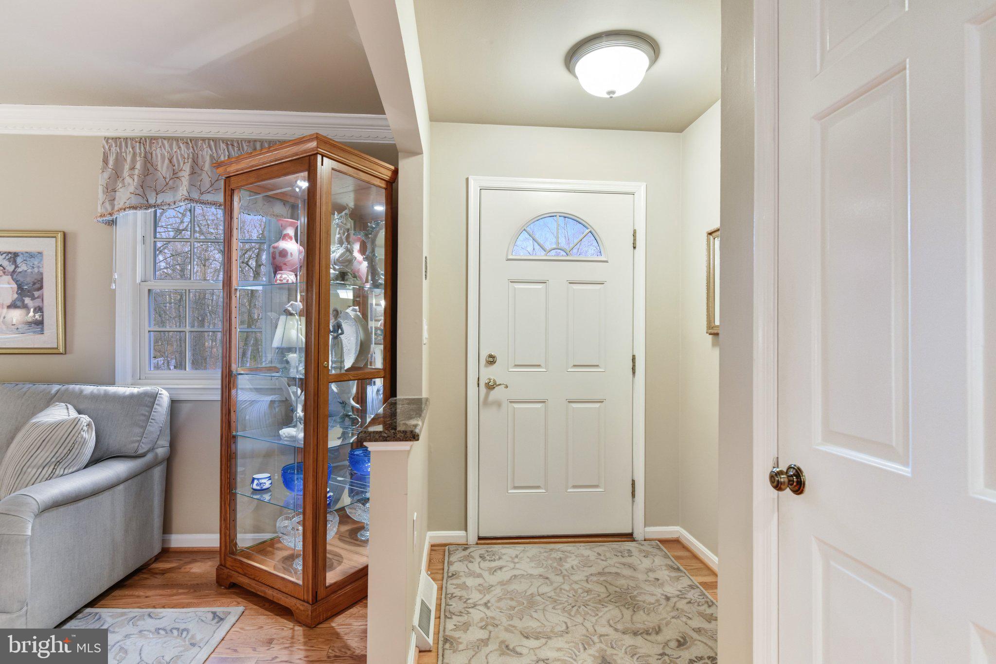 10111 Evans Ford Road Manassas, VA 20111 - Photo 3 of 35 a view of an entryway with wooden floor