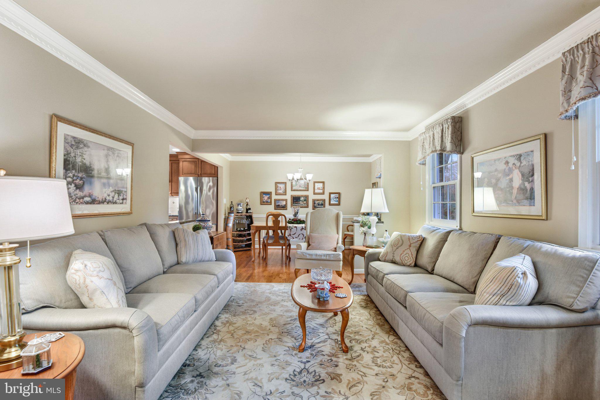 10111 Evans Ford Road Manassas, VA 20111 - Photo 4 of 35 a living room with furniture and wooden floor