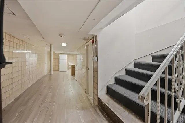 a view of entryway with wooden floor