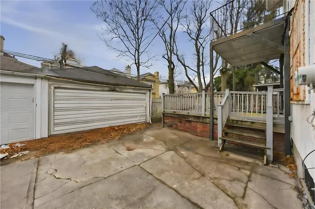 a view of a house with a snow in the yard