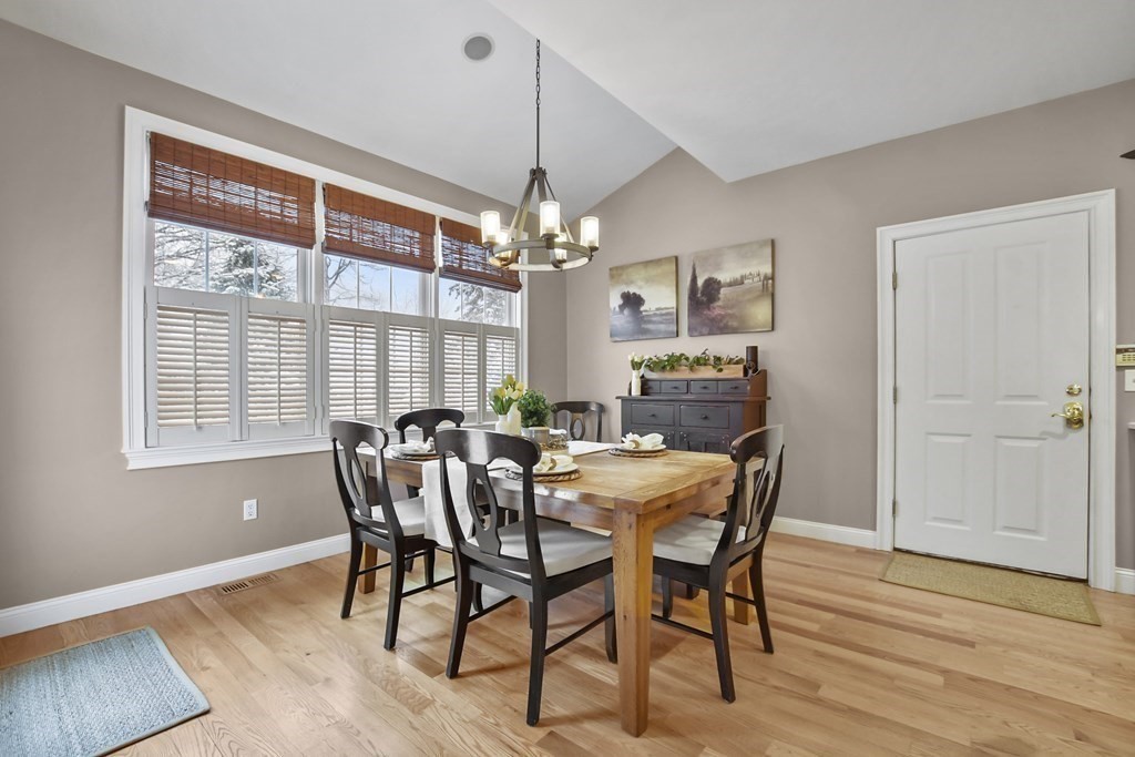 40 Oheir Way Lowell, MA 01852 - Photo 12 of 42 a view of a dining room with furniture window and wooden floor