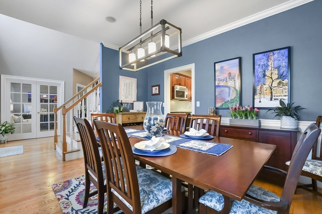 40 Oheir Way Lowell, MA 01852 - Photo 13 of 42 a view of a dining room with furniture and wooden floor