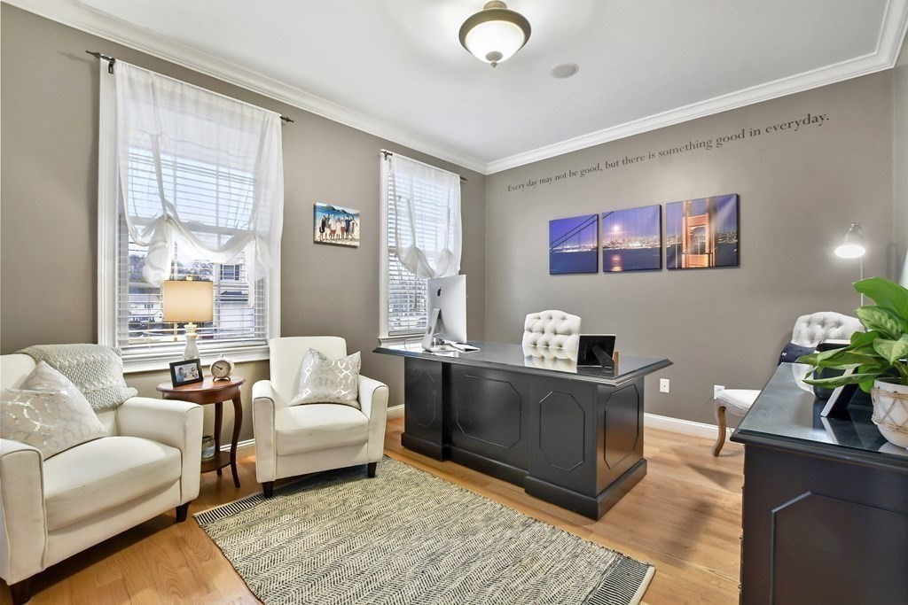 40 Oheir Way Lowell, MA 01852 - Photo 15 of 42 a living room with furniture and a flat screen tv