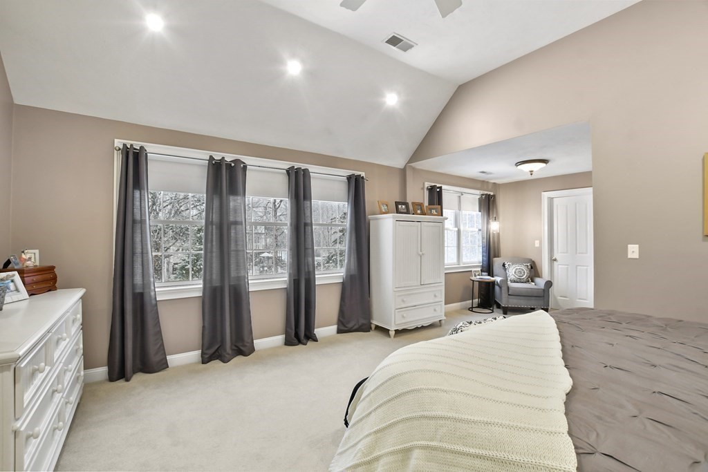 40 Oheir Way Lowell, MA 01852 - Photo 20 of 42 a bed room with a bed and a couch