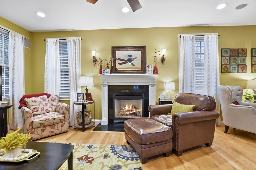40 Oheir Way Lowell, MA 01852 - Photo 3 of 42 a living room with furniture and a fireplace