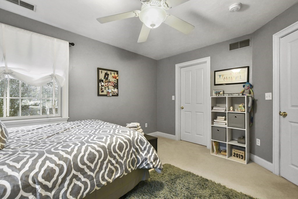 40 Oheir Way Lowell, MA 01852 - Photo 31 of 42 a bedroom with a bed and a window