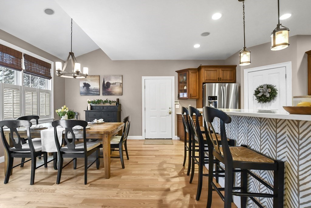 40 Oheir Way Lowell, MA 01852 - Photo 9 of 42 a view of a dining room with furniture window and wooden floor