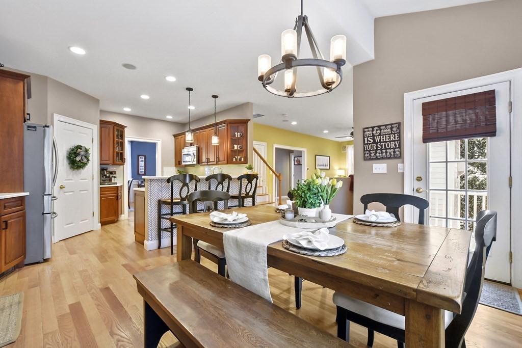 40 Oheir Way Lowell, MA 01852 - Photo 10 of 42 a view of a dining room with furniture and chandelier