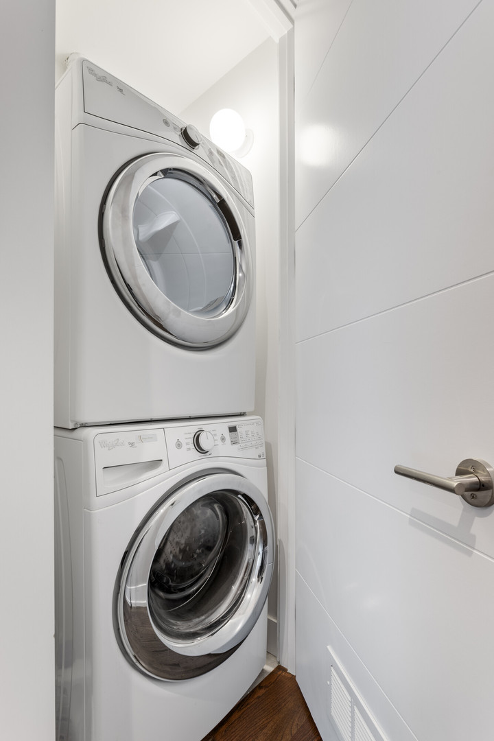 854 North May Street, Unit 2S Chicago, IL 60642 - Photo 13 of 16 a utility room with dryer and washer