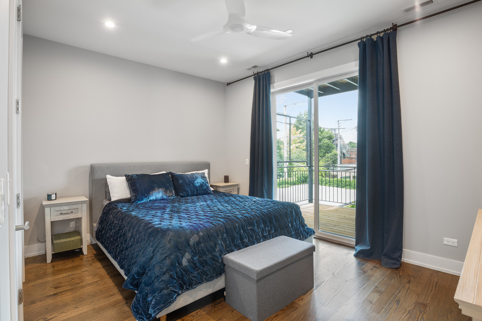 854 North May Street, Unit 2S Chicago, IL 60642 - Photo 8 of 16 a bed sitting in a spacious bedroom next to a window