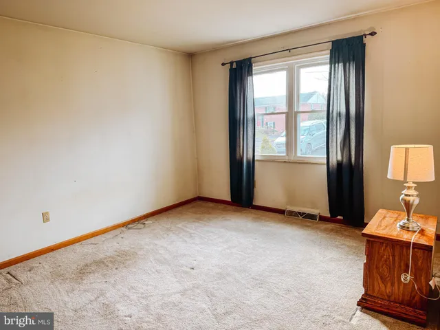 an empty room with a window