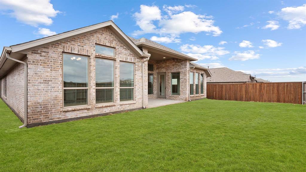 1104 Barnmeadow Lane Forney, TX 75126 - Photo 20 of 33 a view of a house with backyard