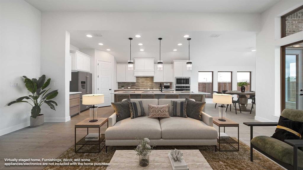 1104 Barnmeadow Lane Forney, TX 75126 - Photo 2 of 33 a living room with furniture and kitchen view