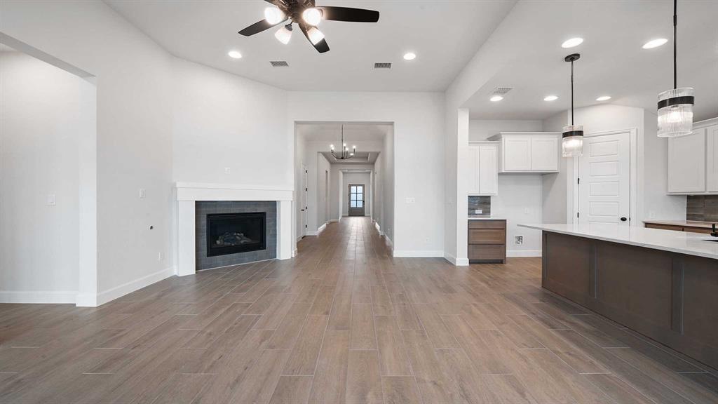 1104 Barnmeadow Lane Forney, TX 75126 - Photo 6 of 33 a view of kitchen with sink and wooden floor