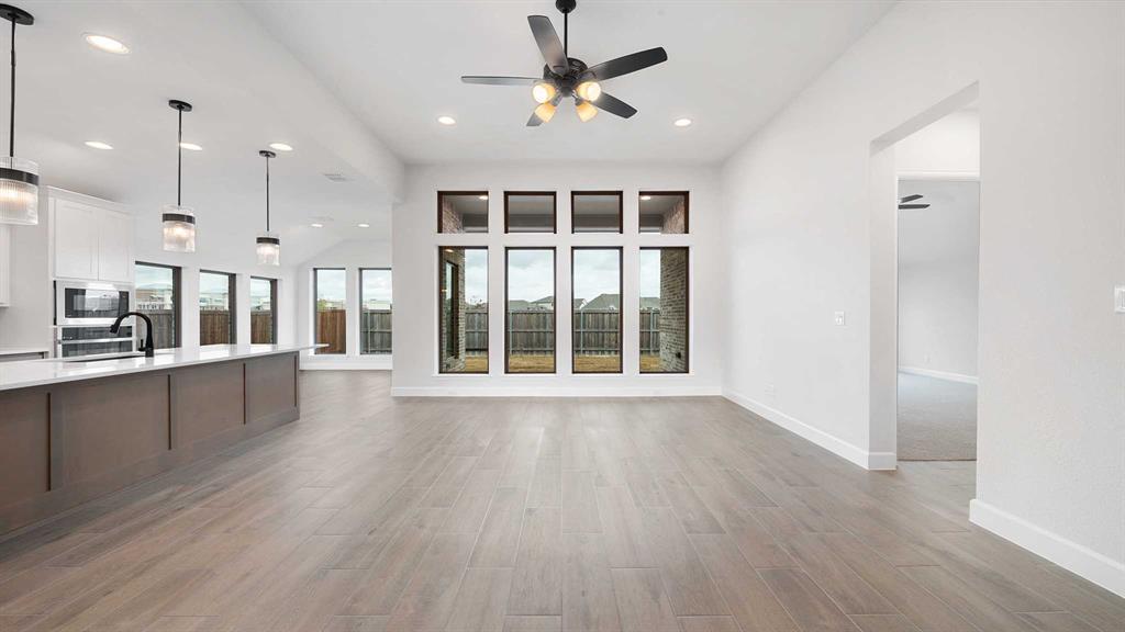 1104 Barnmeadow Lane Forney, TX 75126 - Photo 7 of 33 a view of kitchen with furniture and a large window